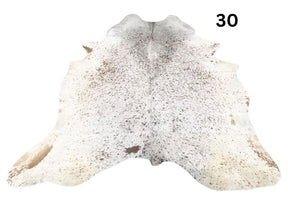 Speckled longhorn cowhide rug number 30 with natural markings and tonal variation on a white background