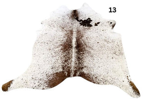 Speckled longhorn cowhide rug small size hide 13 genuine hide with light base and brown speckled markings displayed on white background