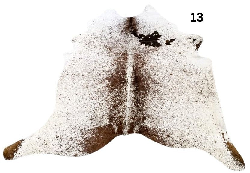 Speckled longhorn cowhide rug small size hide 13 genuine hide with light base and brown speckled markings displayed on white background