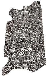 Zebra print cowhide side in black pattern on natural hide displayed as a full leather side