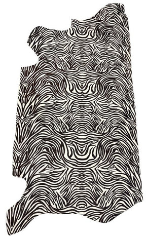 Zebra print cowhide side in black pattern on natural hide displayed as a full leather side