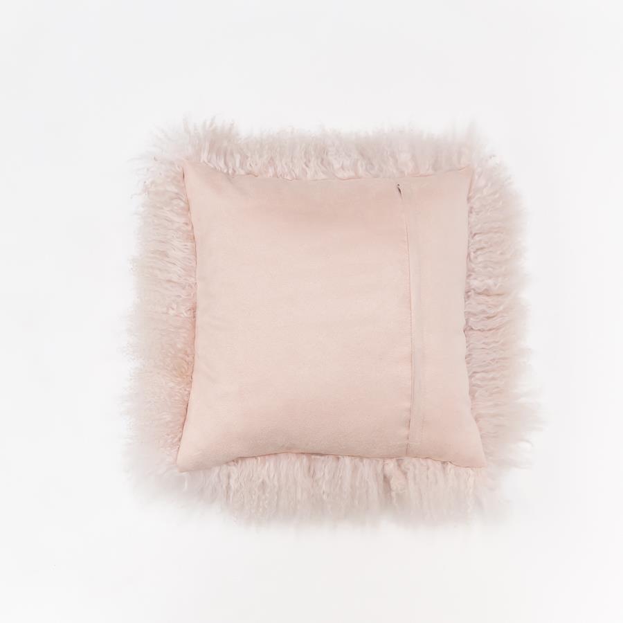 Reverse view of blush Mongolian sheepskin cushion showing smooth cotton velour backing