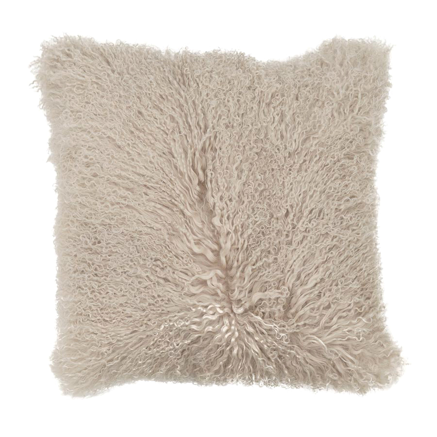 Fawn Mongolian sheepskin cushion with long hair texture photographed flat on a white background