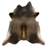 Grey beige cowhide rug example showing natural tonal variation and markings on a white background
