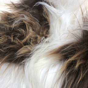 Close-up detail of natural brown and white Icelandic sheepskin wool on a bean bag