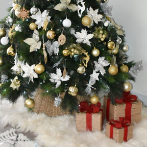 Icelandic sheepskin Christmas tree skirt styled beneath a decorated Christmas tree with wrapped gifts