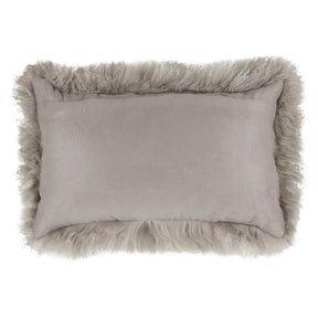 Back view of a grey Mongolian sheepskin lumbar cushion with white tips and cotton velour backing