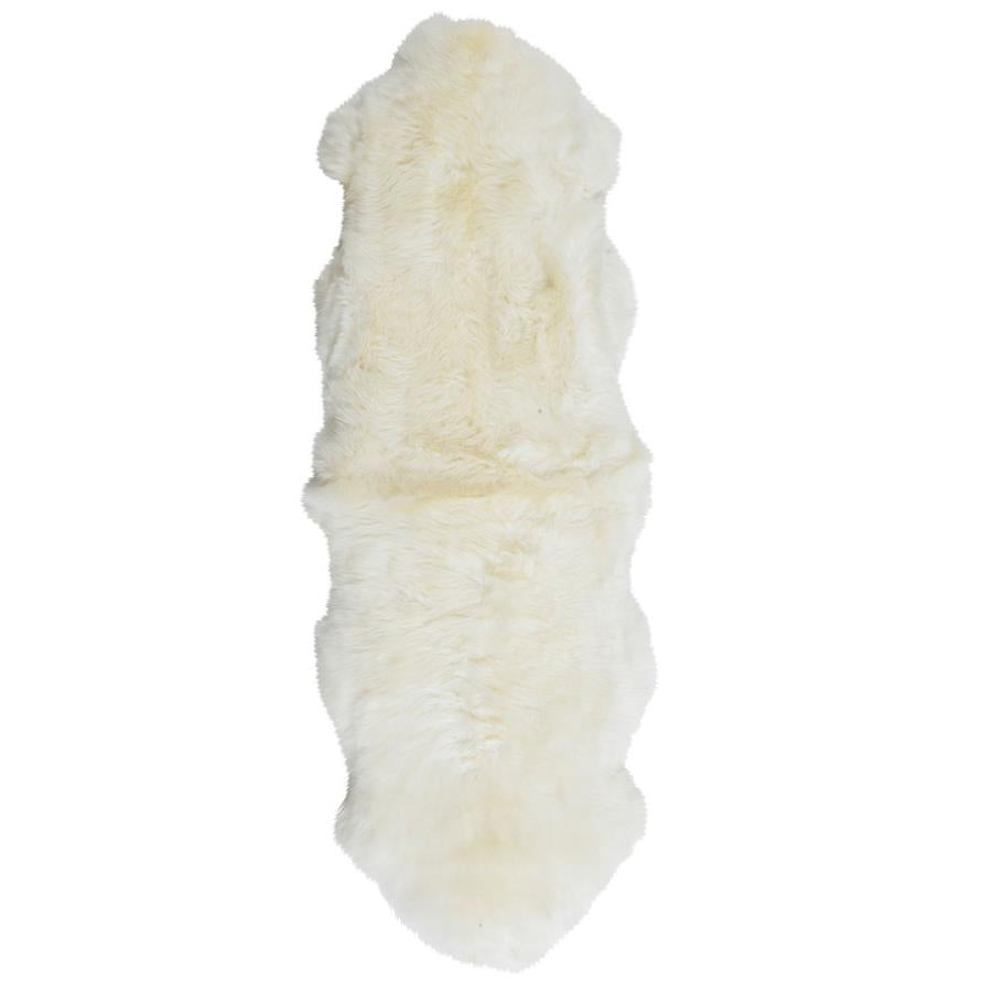 White Merino sheepskin double hide showing the natural shape of two skins sewn together
