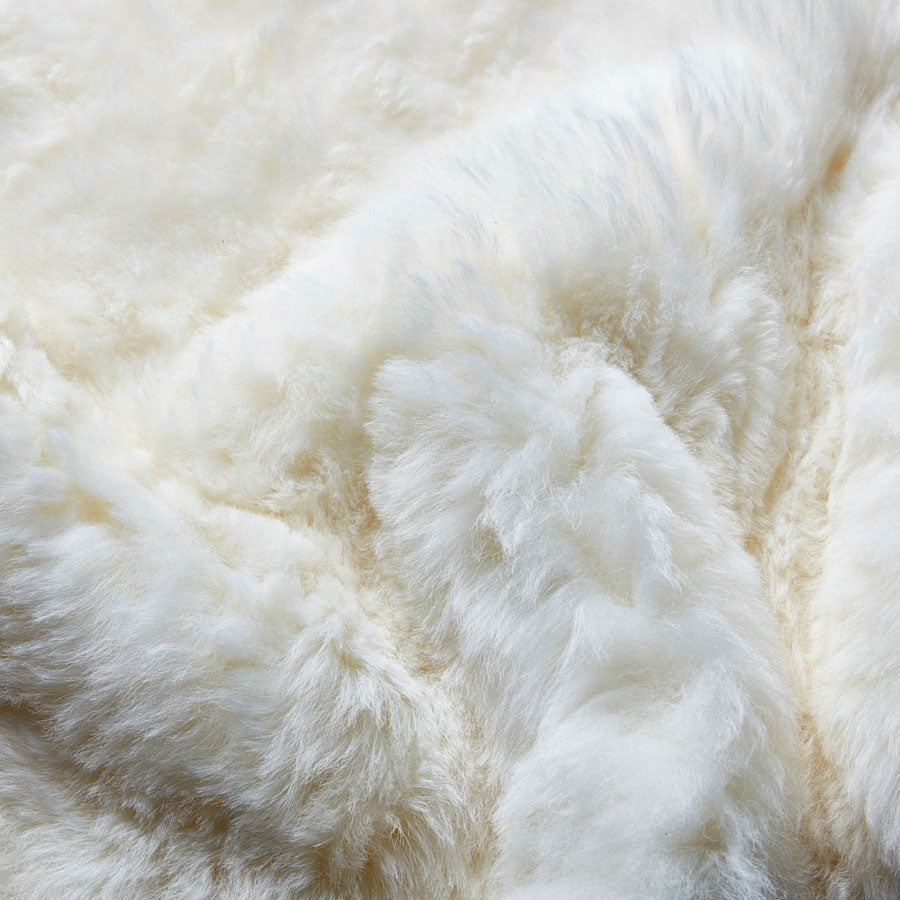 Close-up of the shorn wool texture of an Icelandic sheepskin rug in natural white